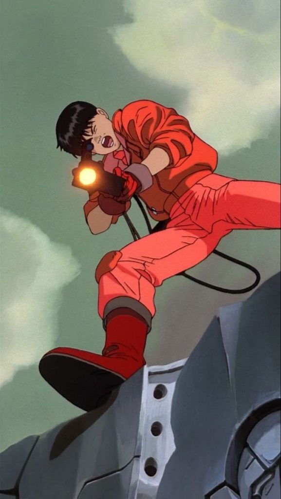 Kaneda apuntando con el laser